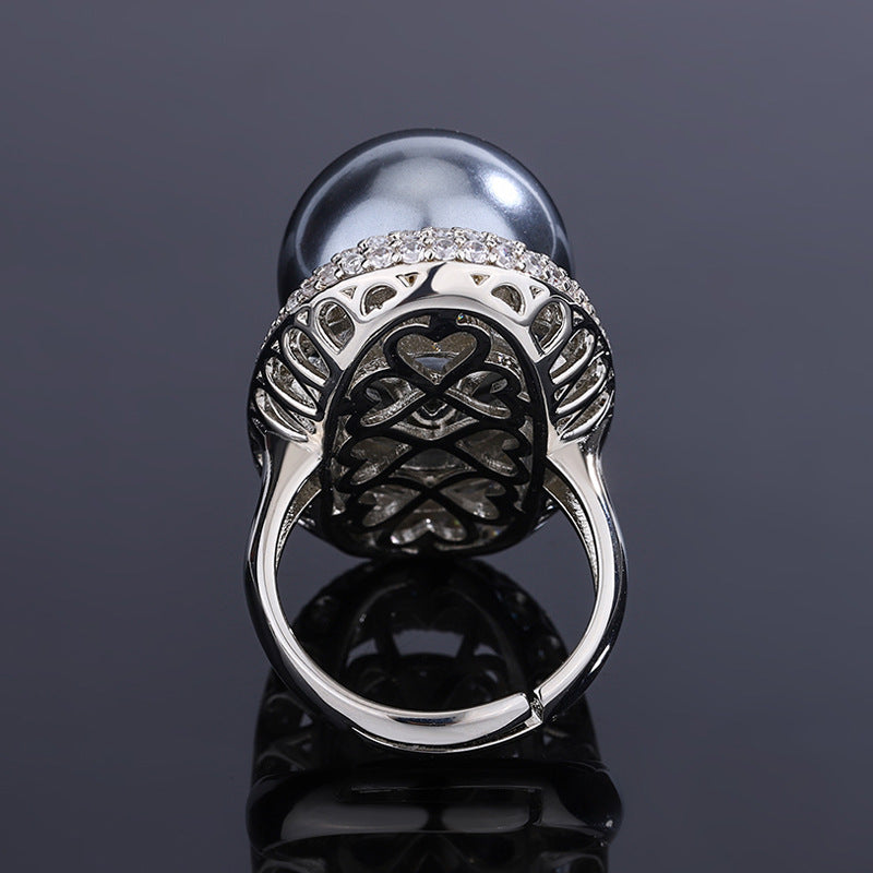 Celestial Saturn-Inspired Pearl and Crystal Halo Statement Ring