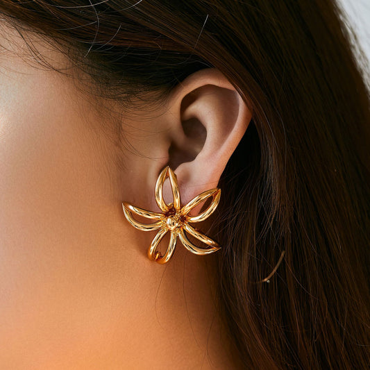 Boucles d'oreilles pendantes à motif floral abstrait