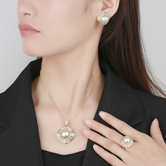 Elegant Pearl and Shimmering Baguette Crystal Jewelry Set