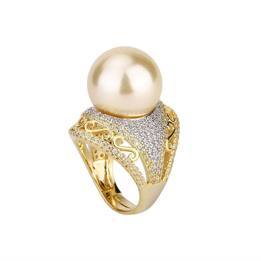 Luxurious Golden Pearl Ring with Shimmering Crystal Accents