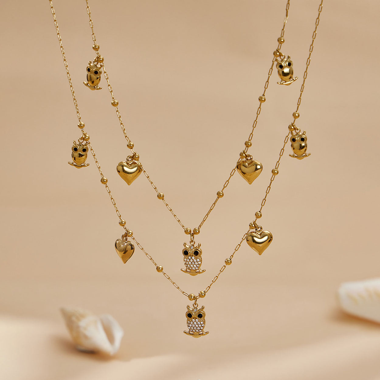 Bijoux fantaisie avec pendentif hibou et cœur 