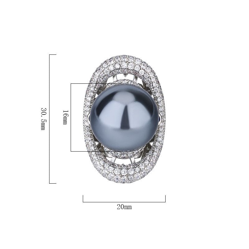 Celestial Saturn-Inspired Pearl and Crystal Halo Statement Ring