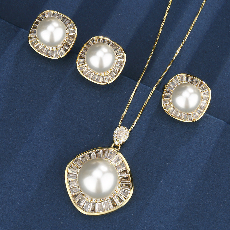 Elegant Pearl and Shimmering Baguette Crystal Jewelry Set