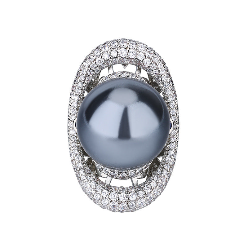 Celestial Saturn-Inspired Pearl and Crystal Halo Statement Ring