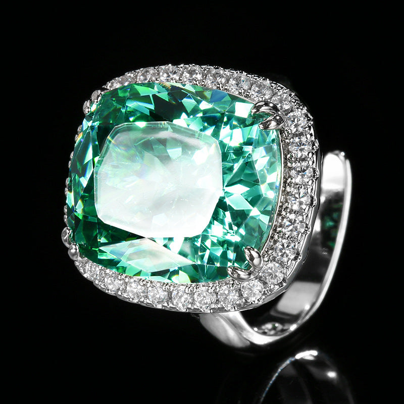 Luxurious Emerald Green Oval Halo Set