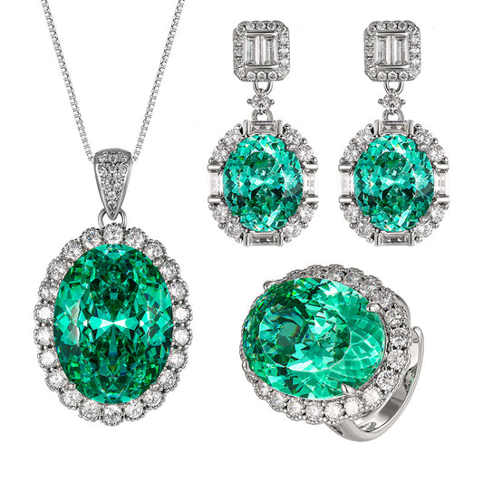 Luxurious Teal Emerald Oval Halo Set