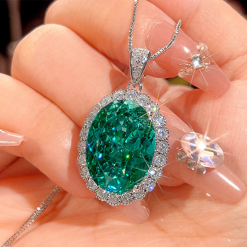 Luxurious Teal Emerald Oval Halo Set