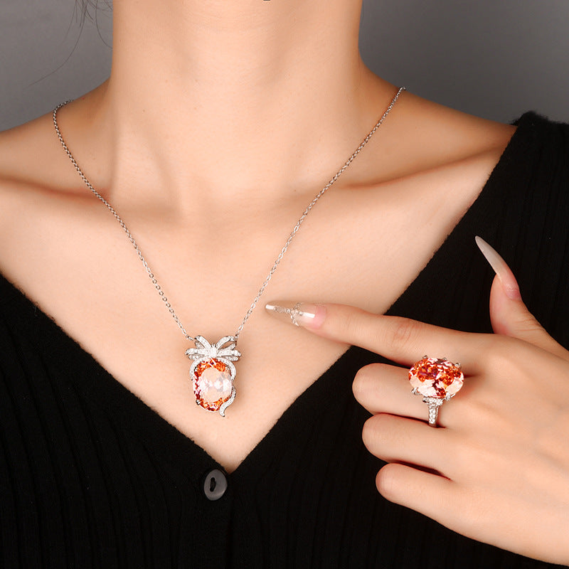 Elegant Oval Gemstone Bow-Knot Pendant and Ring Set