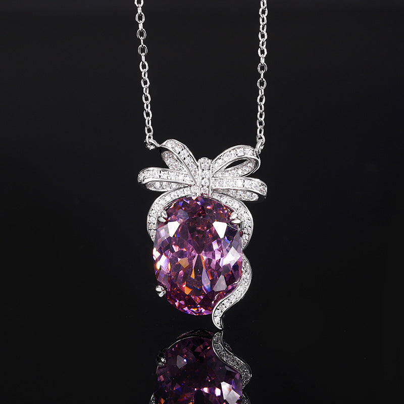 Elegant Oval Gemstone Bow-Knot Pendant and Ring Set