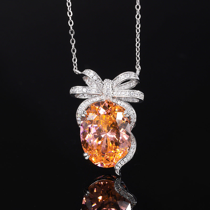 Elegant Oval Gemstone Bow-Knot Pendant and Ring Set
