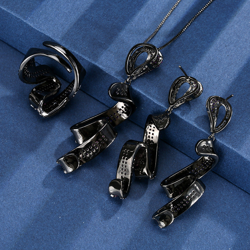 Shimmering Fuchsia Ribbon Swirl Jewelry Set with Black Metal