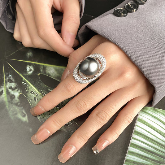 Celestial Saturn-Inspired Pearl and Crystal Halo Statement Ring
