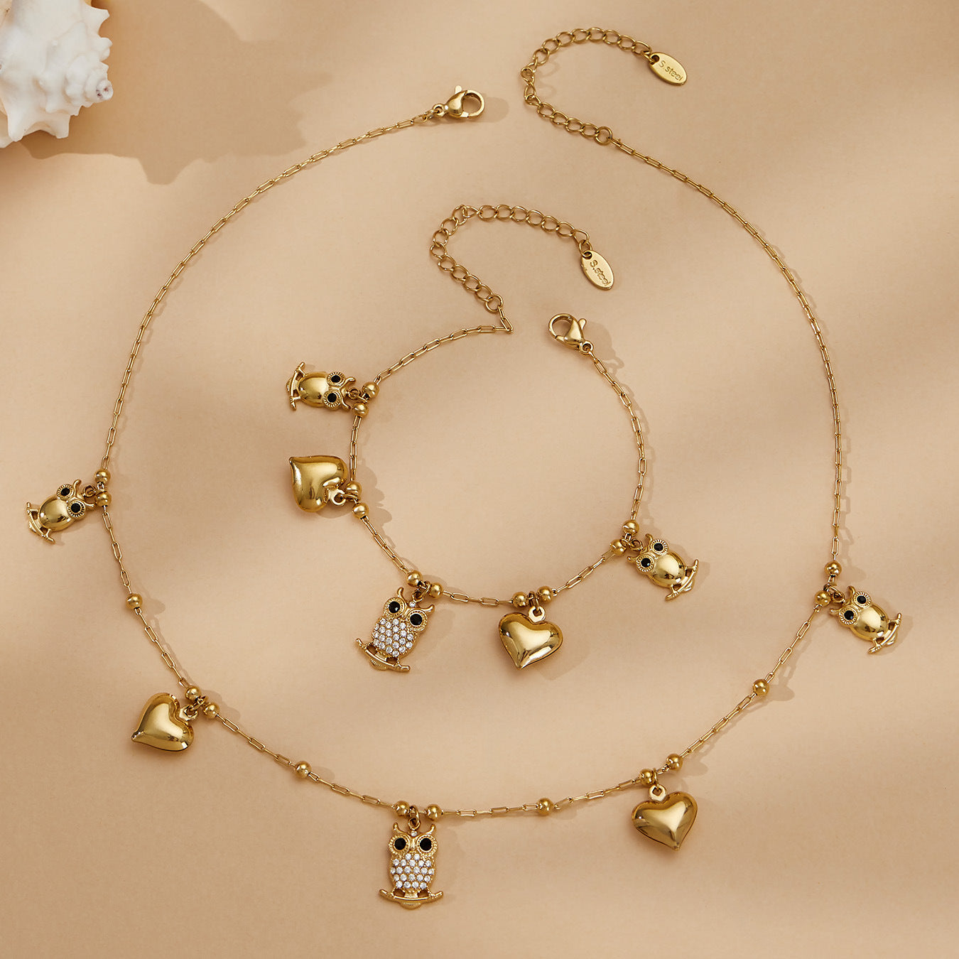 Bijoux fantaisie avec pendentif hibou et cœur 