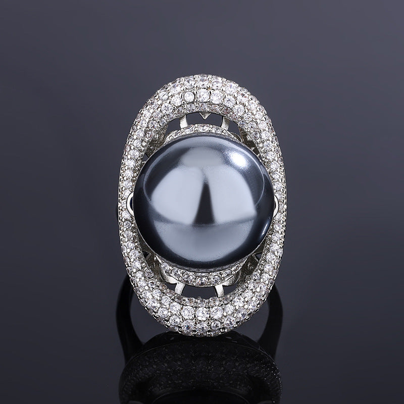 Celestial Saturn-Inspired Pearl and Crystal Halo Statement Ring